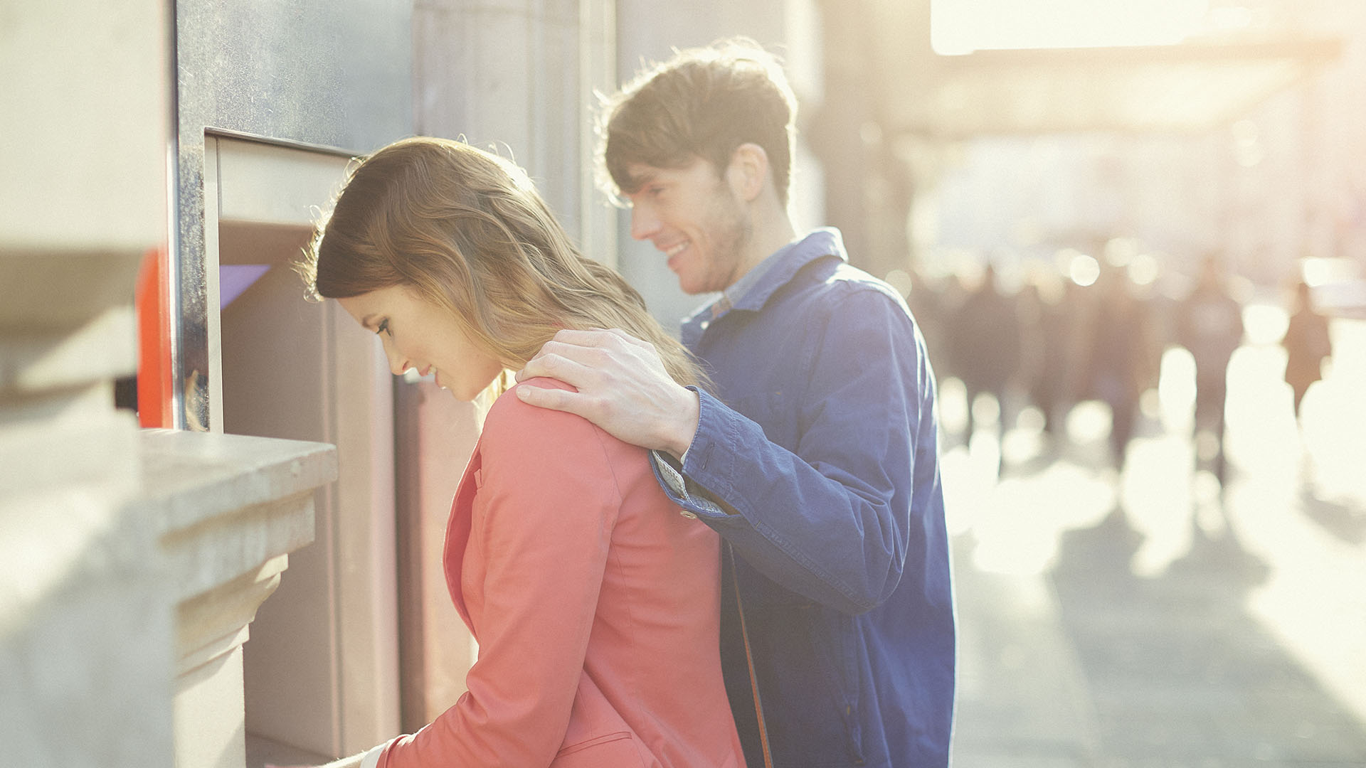 couple at bank machine
