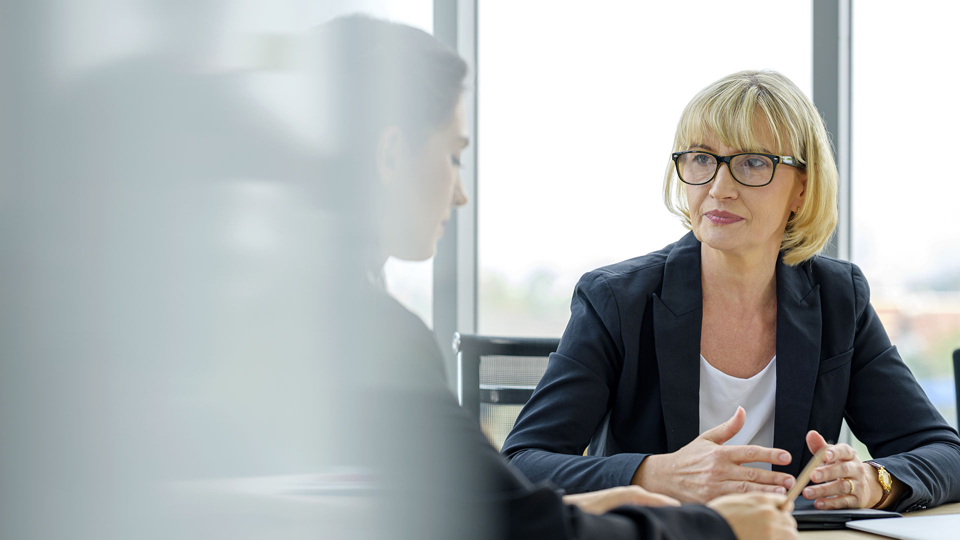 two people talking in the workplace