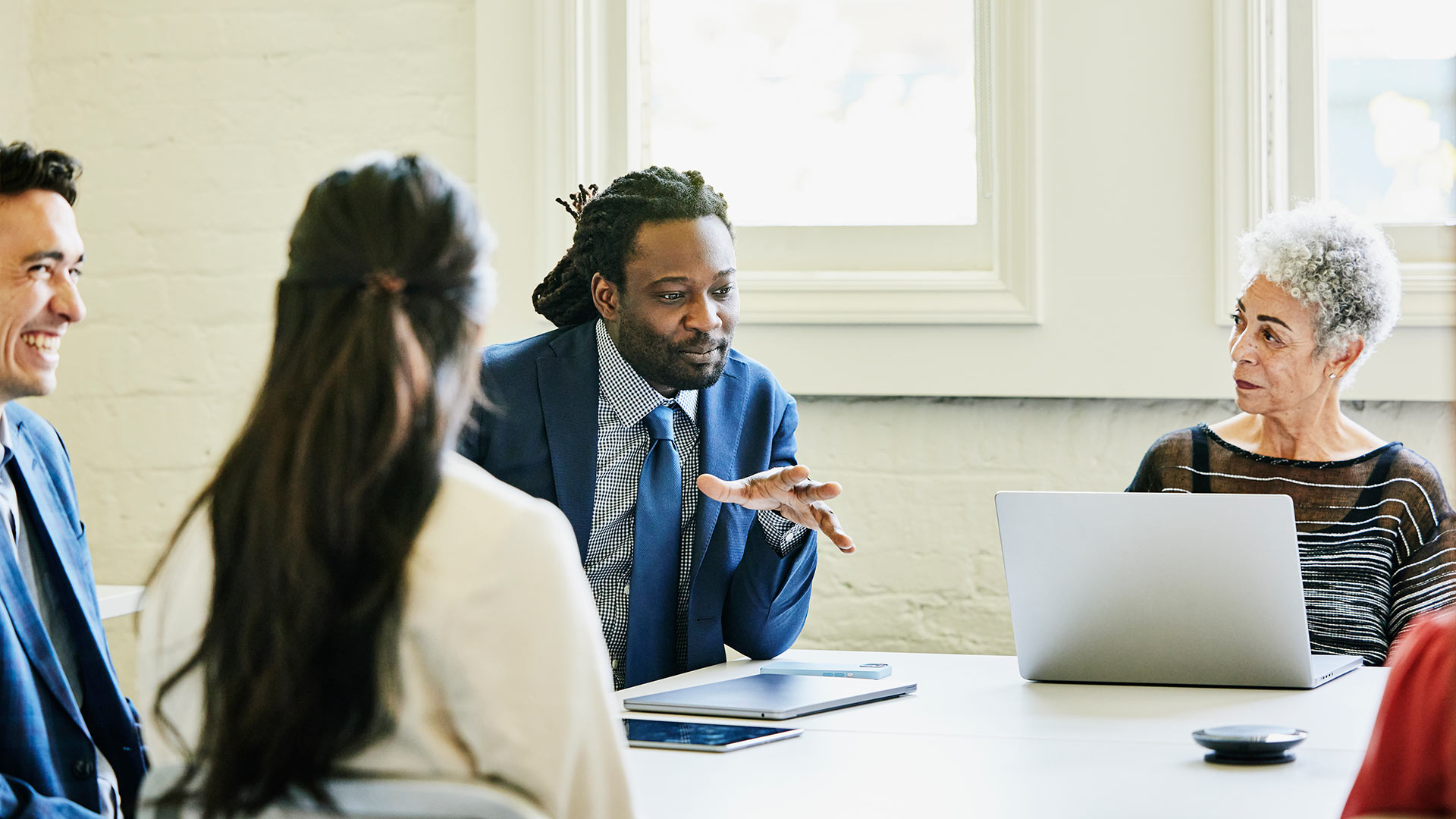 employees discussing commitment to DEI initiatives